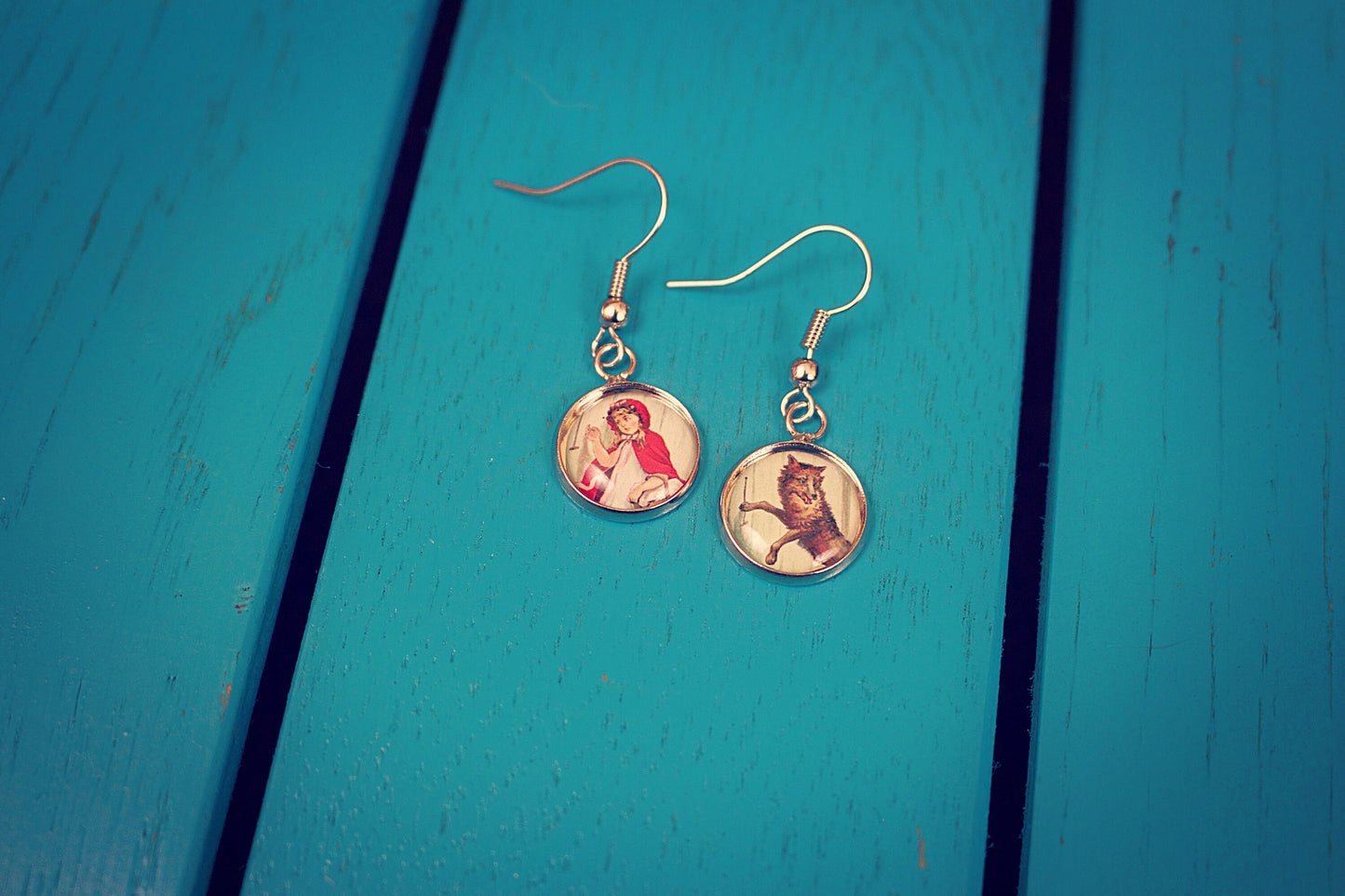 Red Riding Hood Earring. Vintage book illustration. Fairytale. Little Red and the wolf. Brothers Grimm. Antique storybook.
