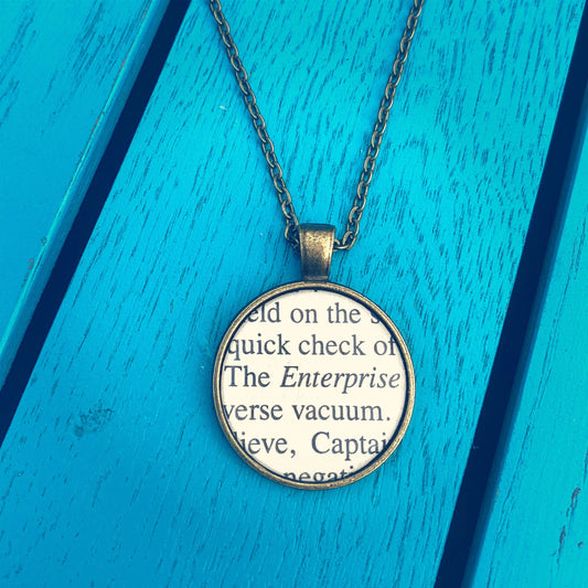 Recycled book page necklace. Star Trek inspired gift. The Enterprise. Captain Kirk Spock Uhuru Scotty Sulu.