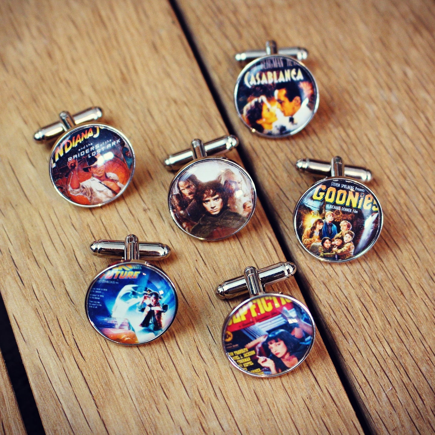 Christmas Movie Poster Cufflinks. Tie Clips. Pocket Watch. Holiday Film. Elf. Santa Clause. Grinch. Home Alone. It's a Wonderful Life.