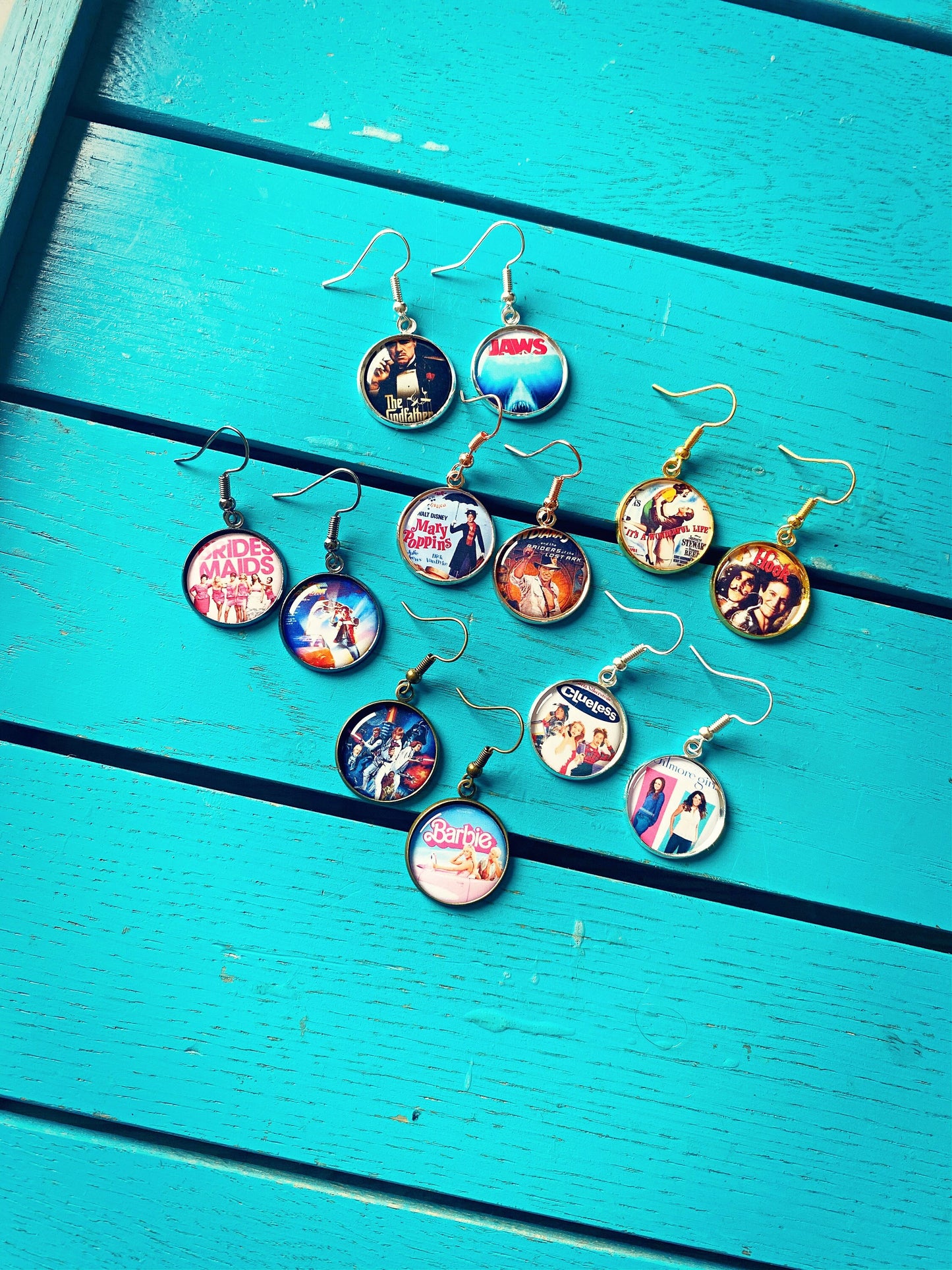 Christmas Movie Poster Earrings. Necklace. Holiday Film Jewellery. Elf. Santa Clause. Grinch. Home Alone. It's a Wonderful Life. Muppets.