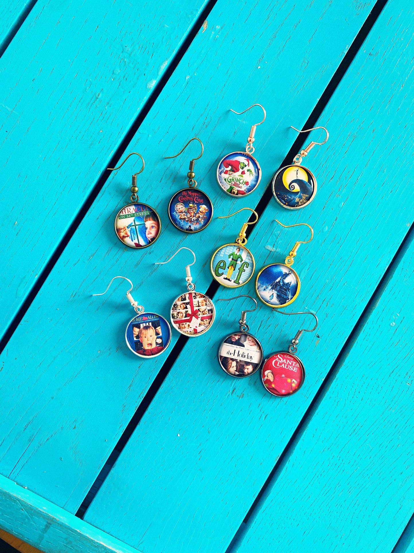 Christmas Movie Poster Earrings. Necklace. Holiday Film Jewellery. Elf. Santa Clause. Grinch. Home Alone. It's a Wonderful Life. Muppets.